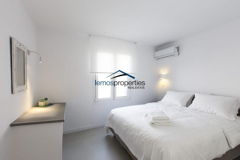 The second bedroom with a double bed, which can be separated into 2 single beds