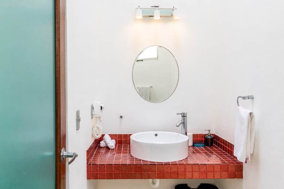 Modern style and hairdryer amenity.