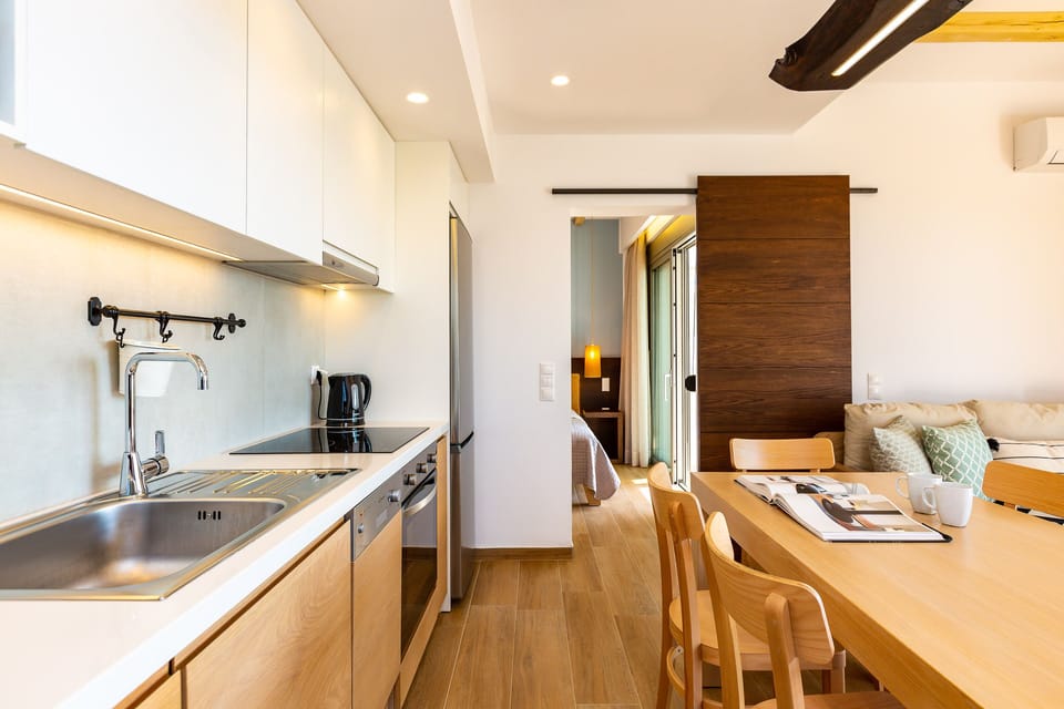 The living room offers an energy fireplace and a sofa with a pull-out bed for the 10th guest.