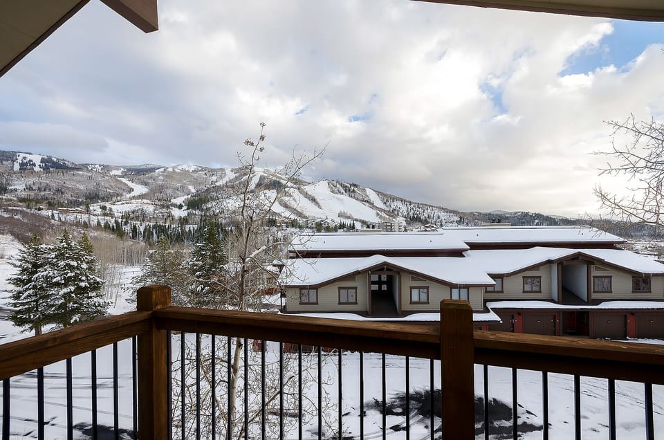 Step onto your private balcony and breathe in the crisp mountain air while soaking up stunning winter vistas of snow-capped peaks.