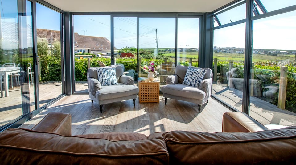 Curl up with a book & admire the views to sea.