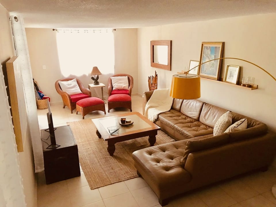 The Living Room where you can enjoy some music or watch the smart TV.