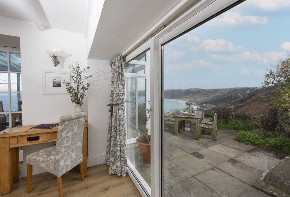 Adanac, Sennen Cove. Ground floor: French doors leading to your patio garden