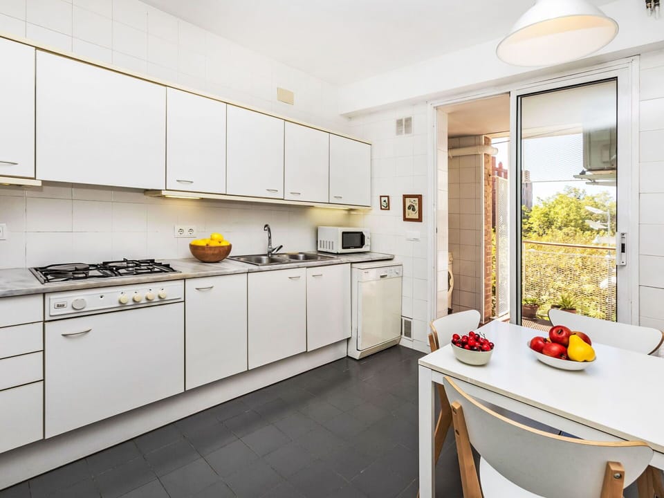 Cabinetry, Countertop, Kitchen, Kitchen Stove, Kitchen Appliance, Window, Interior Design, Floor, Flooring, Major Appliance