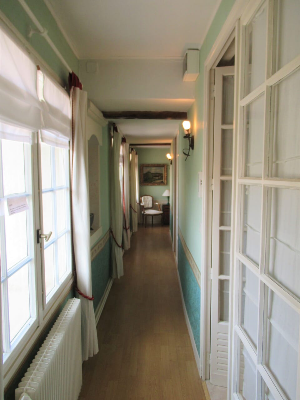 Upstairs hallway off of which are two double bedrooms and a family bathroom.
