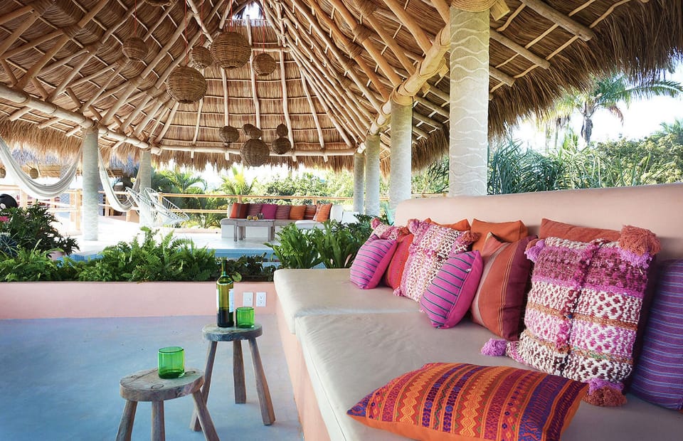 The living room lounging area with view of the Ocean