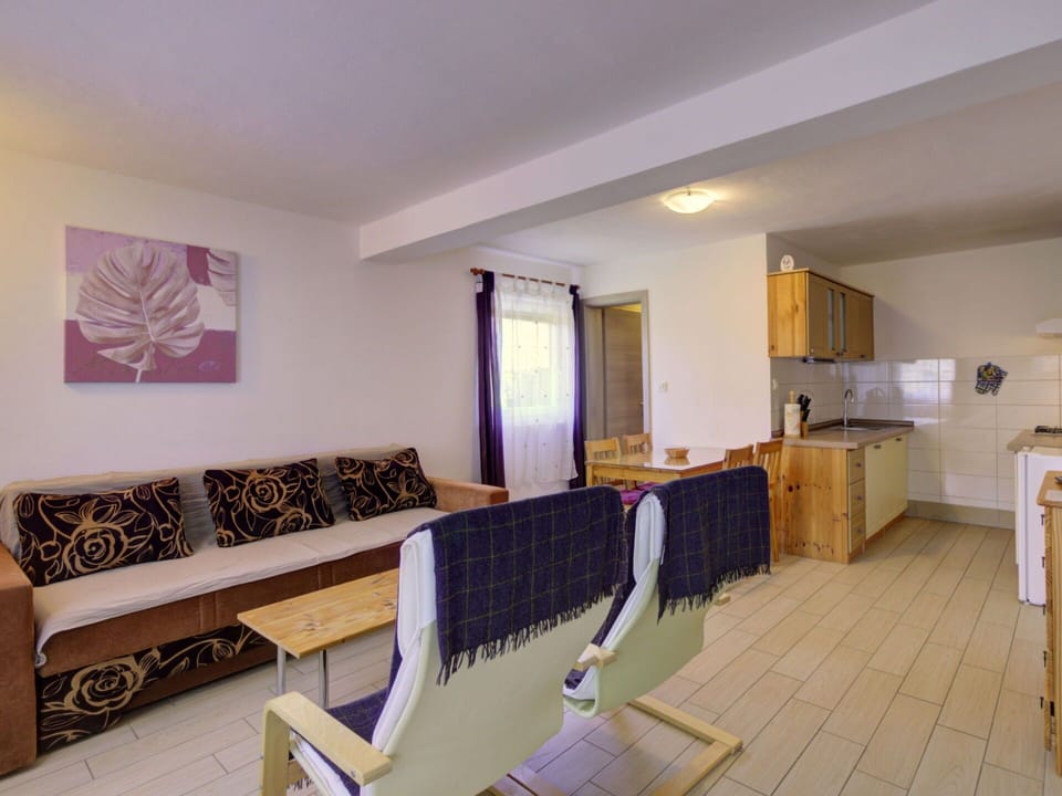 Furniture, Interior Design, Floor, Ceiling, Flooring, Room, Chair, Apartment, Wood Stain, Living Room
