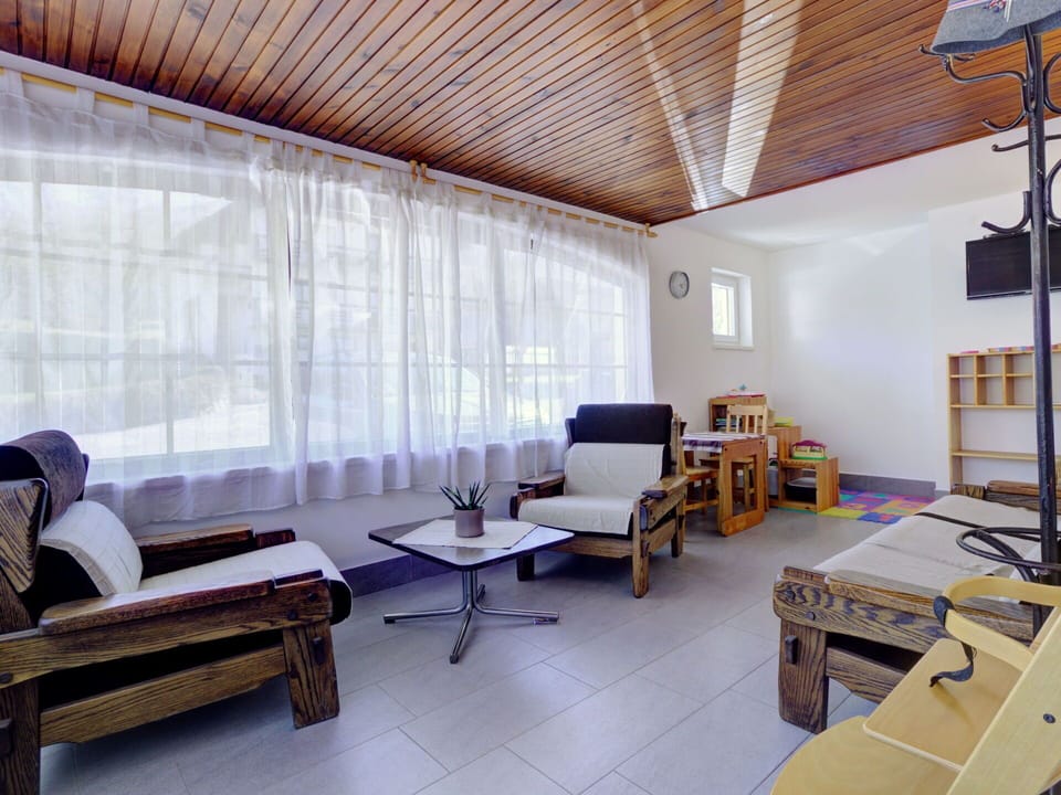 Furniture, Interior Design, Flooring, Floor, Wood, Ceiling, Room, Lighting, Couch, Apartment