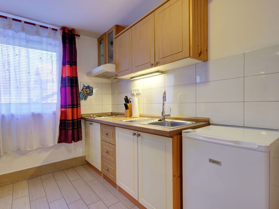 Kitchen, Major Appliance, Countertop, Wood, Interior Design, Flooring, Kitchen Appliance, Cabinetry, Plumbing Fixture, Sink