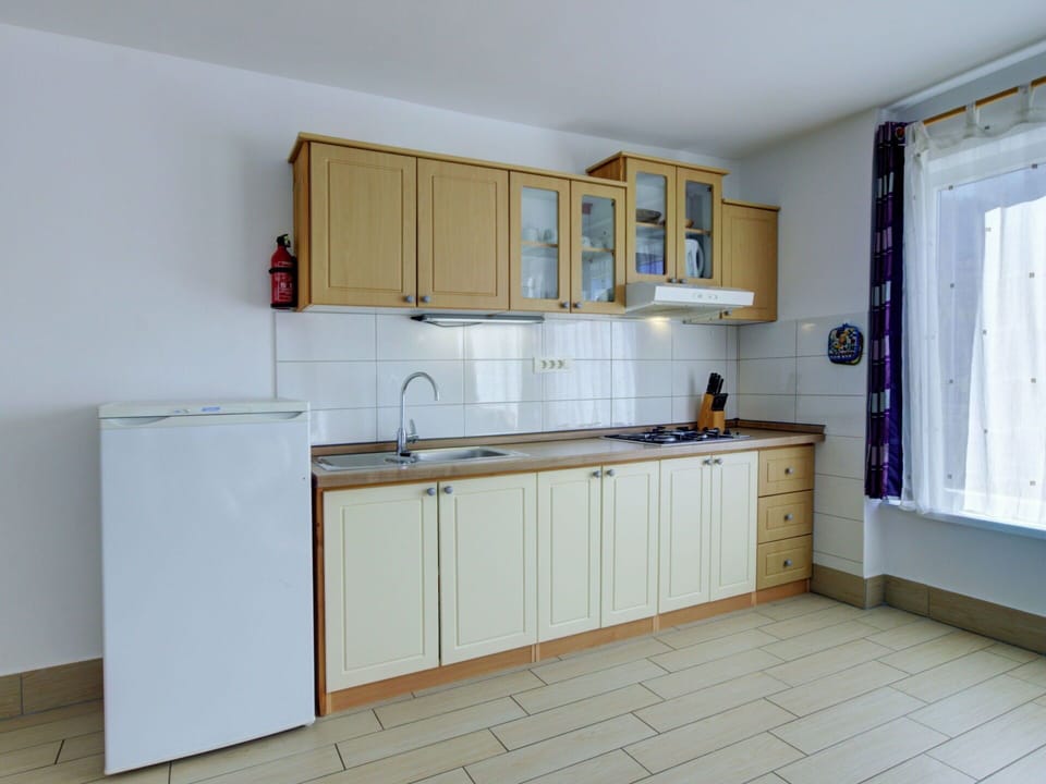 Kitchen, Kitchen Appliance, Countertop, Wood, Flooring, Cabinetry, Major Appliance, Interior Design, Kitchen Sink, Floor