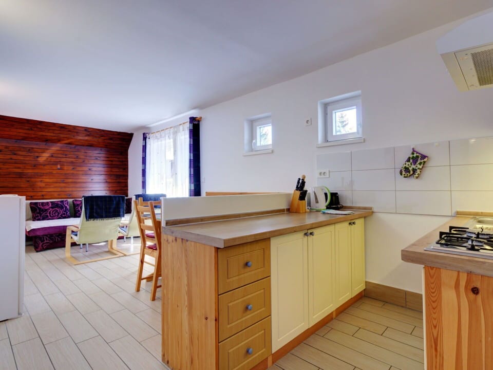 Wood, Flooring, Interior Design, Floor, Ceiling, Kitchen, Countertop, Furniture, Room, Cabinetry