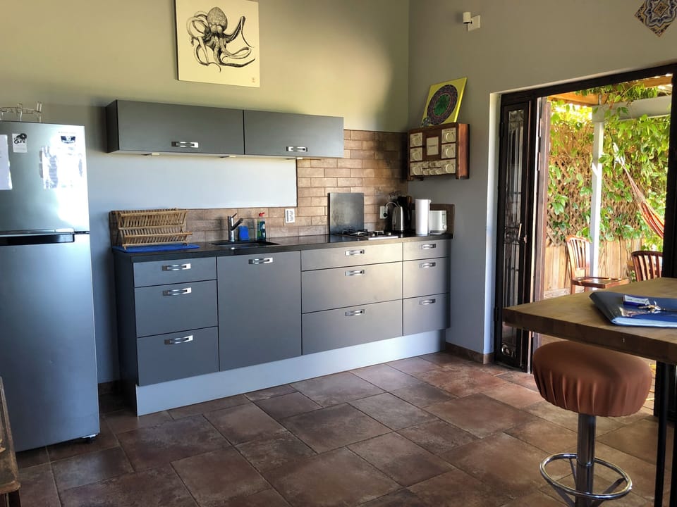 Complete kitchen: full sized refrigerator, gas burners, convection oven.