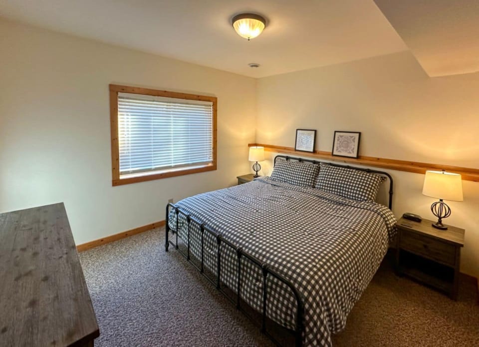 Lower Level Bedroom With King Bed