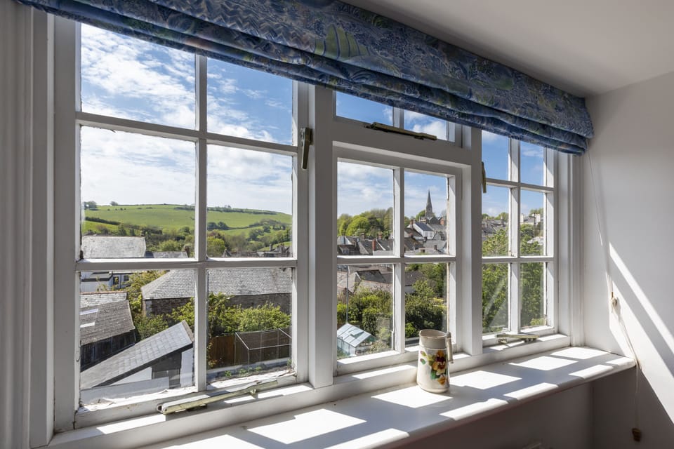 View over rooftops and meadows of Modbury from Bedroom 1