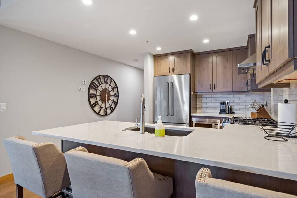 Open concept kitchen with gas range
