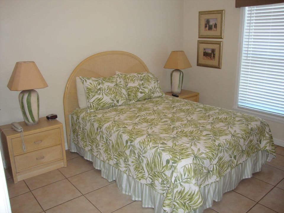 The second bedroom has queen bed and private access to the hall bath with shower