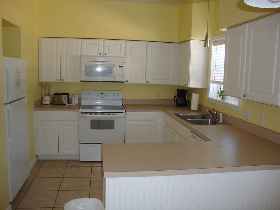 FULL Kitchen with complete cookware, dinnerware, glassware and silverware