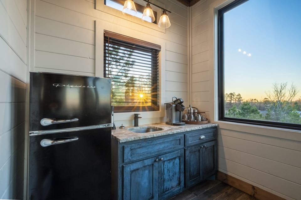 The game room mini bar and extra Keruig coffee maker!