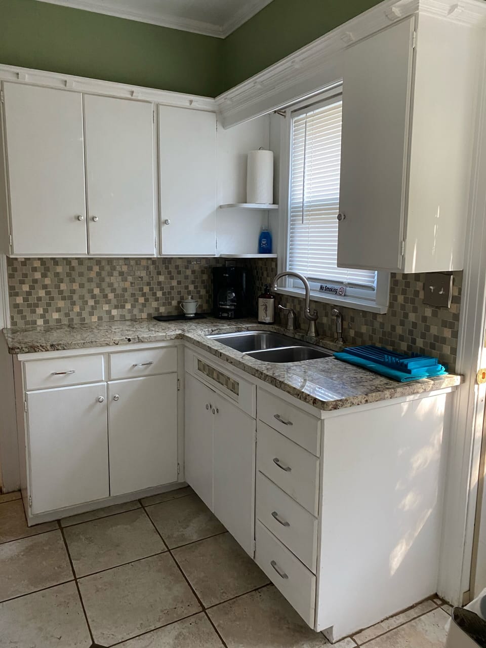 Remodeled kitchen with exotic granite counter tops