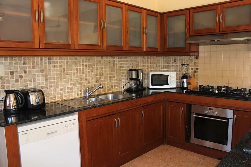 The fully equipped open plan kitchen