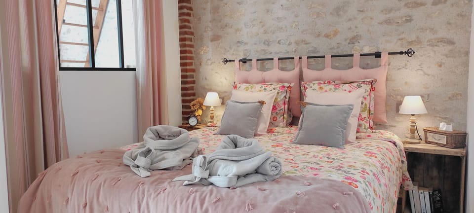 Chambre parentale toute douce avec lit double (160x200)
Verrière en fer forgé