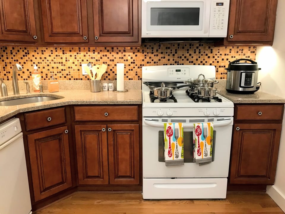 Gas stove, oven, and microwave oven