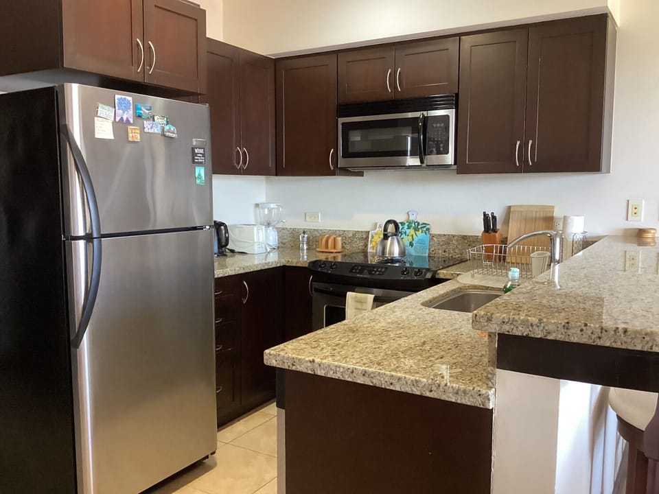Private kitchen with stone countertop