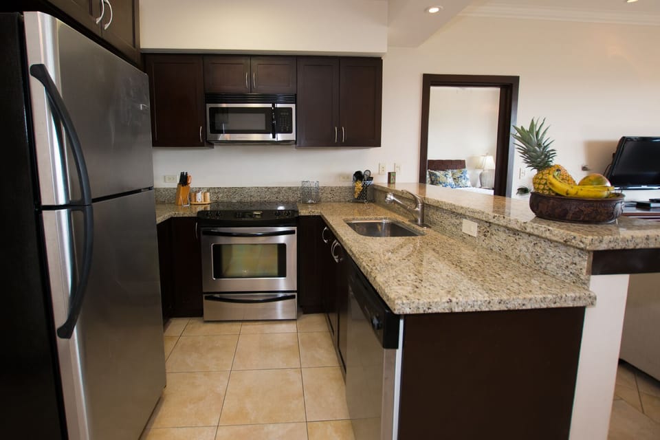 Private kitchen with stone countertop
