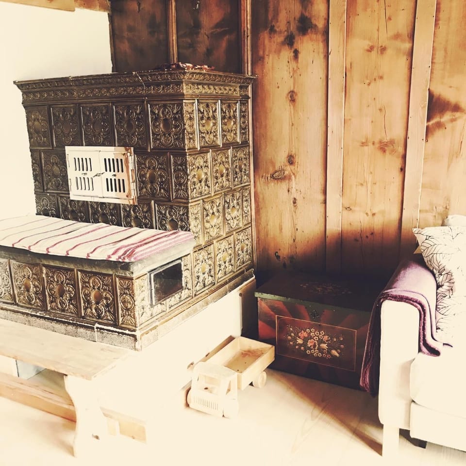 Wood stove in living room, lower apartment