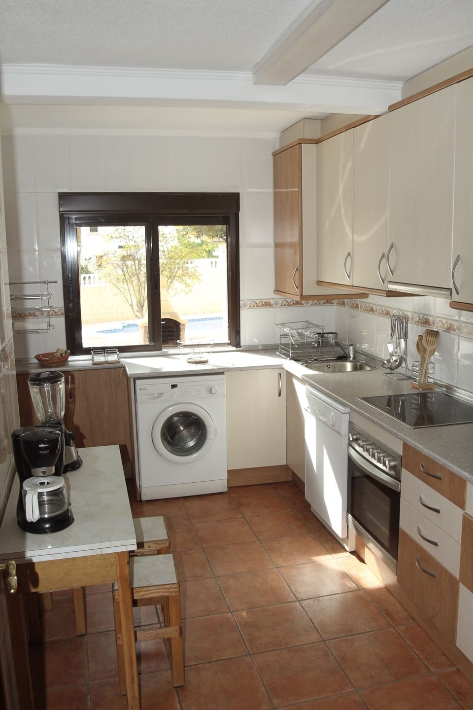 Kitchen with main appliances includes dishewasher