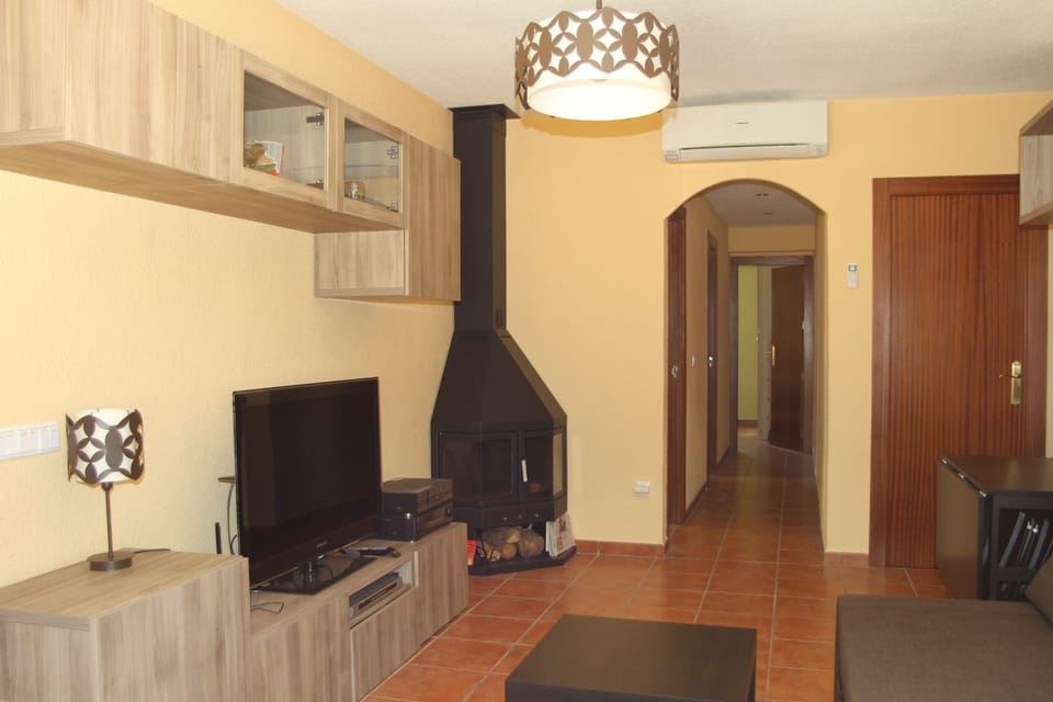 Living area with Air con , WIFI Internet , TV with Spanish channels