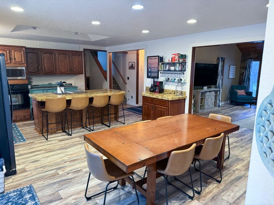 Open kitchen, living, dining - view from garage