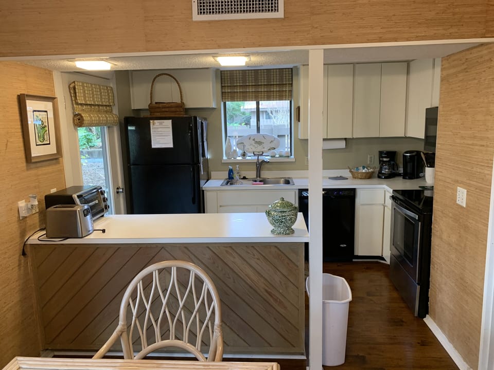 Kitchen area. Kureg and Conventional Coffee Pot. 
