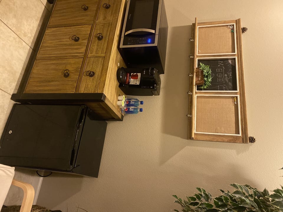 Refrigerator Microwave and coffee bar 