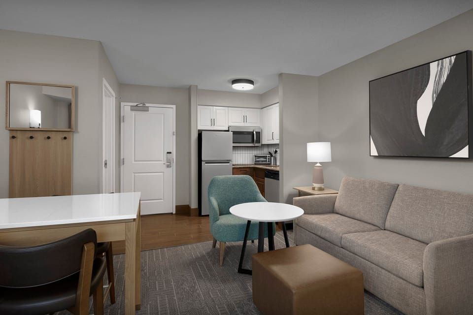 Relax in style with cozy seating and a bright, inviting atmosphere to unwind after your day.