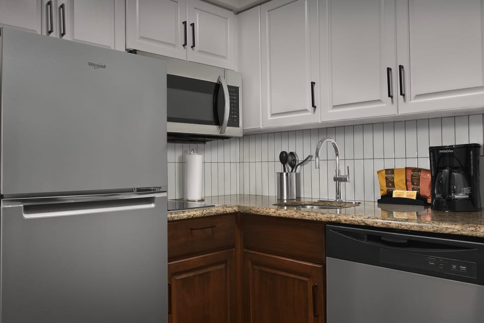 Your culinary adventures begin here with modern appliances and ample counter space for meal prep.