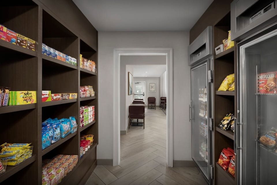 Discover a convenience store stocked with snacks and drinks, making it easy to grab a treat anytime.