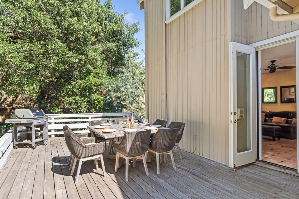 Alternative dining area on back deck for 8 with barbeque.
