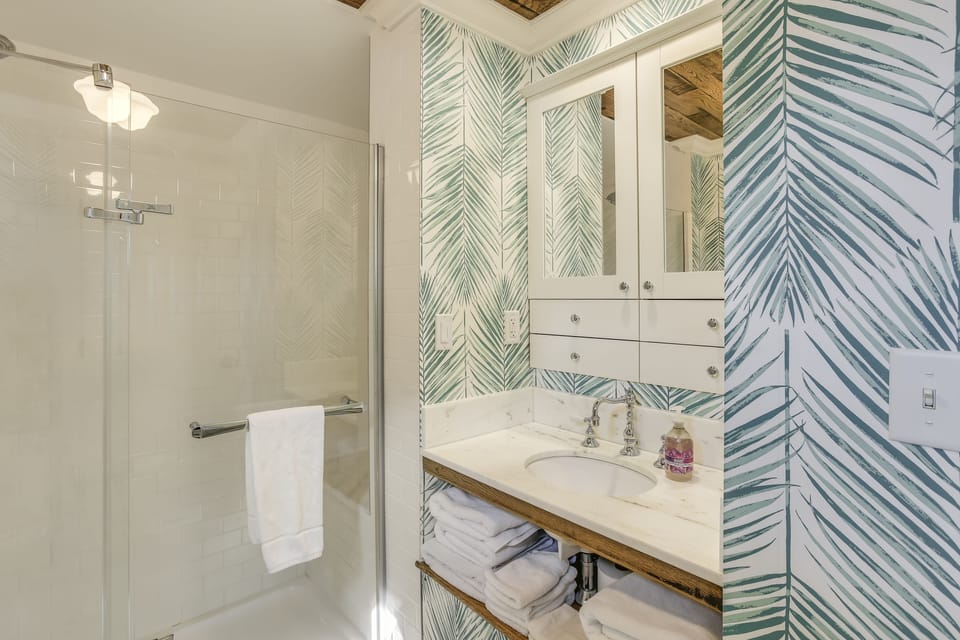 Master Bathroom. Marble flooring and spacious shower.