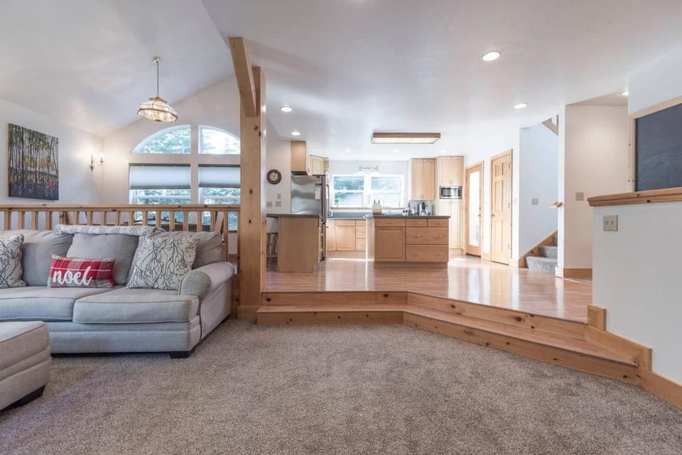 The open layout links the well-appointed kitchen