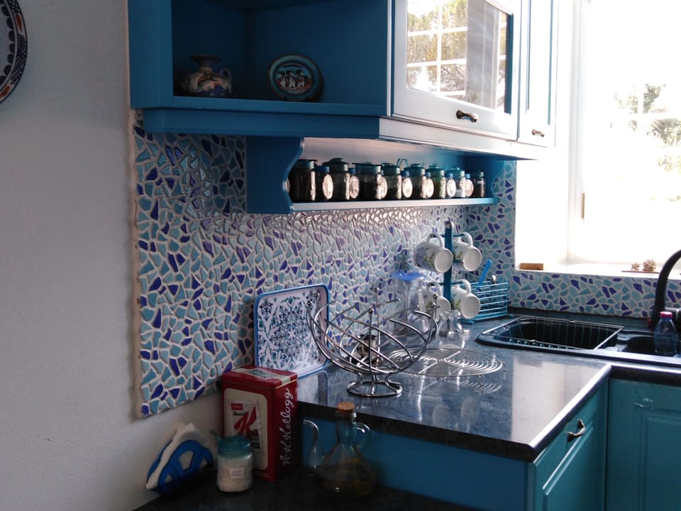the dishware and utensils in the kitchen
