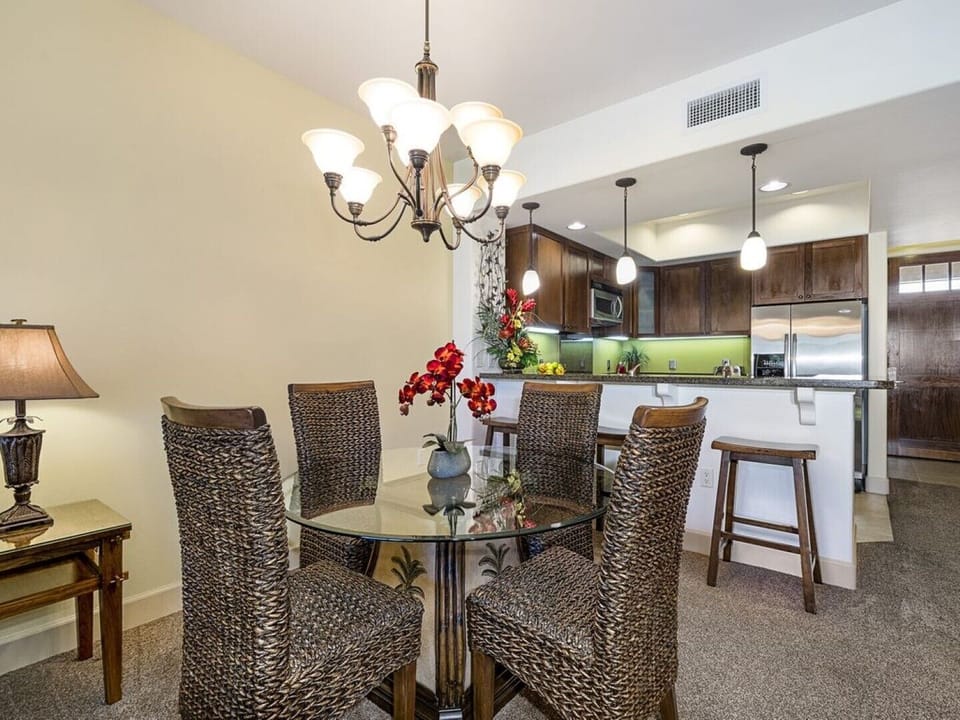 Dining table and breakfast bar...new wood floors since photos taken