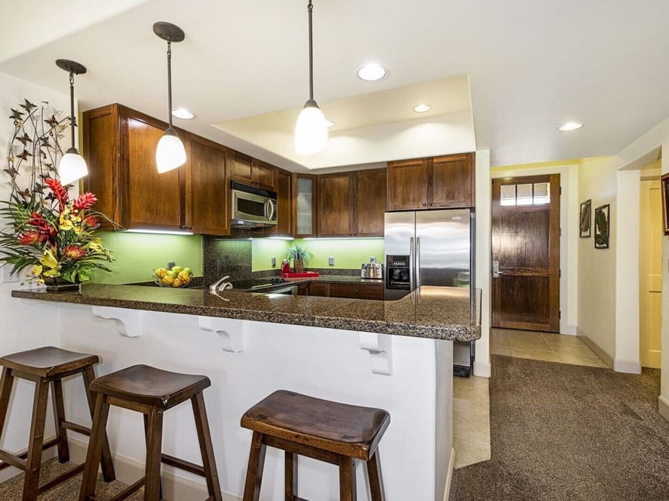 Kitchen with breakfast bar...new wood floors since photos taken