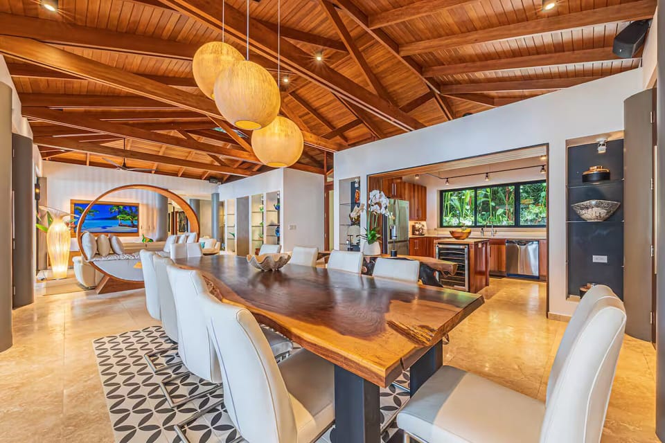 Open-plan dining flows into the living space and kitchen for easy connection.