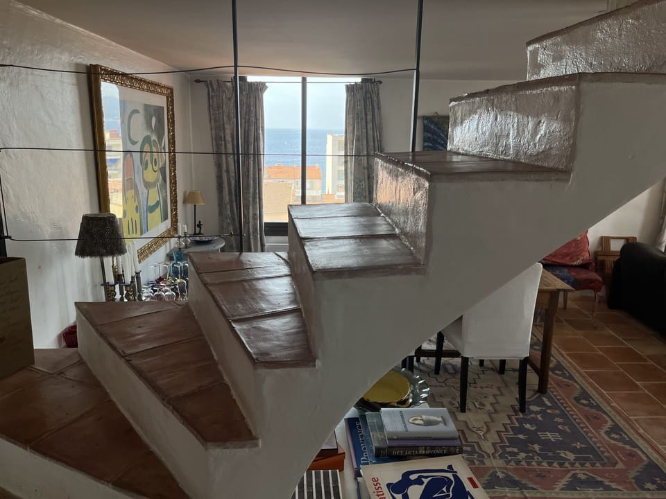 The living room/stairs