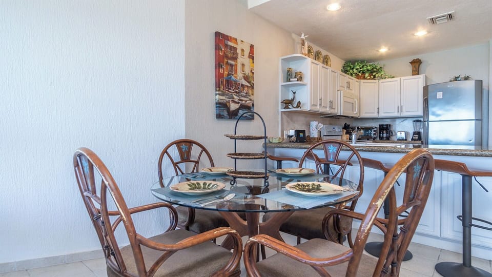 The dining table seats four.
