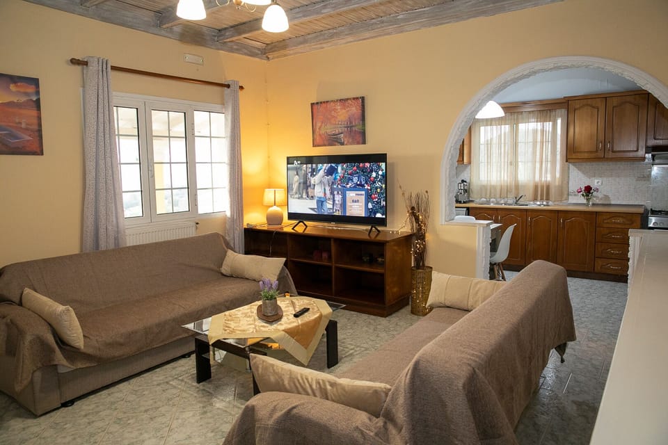 Maria’s House Arillas Corfu- living room and TV