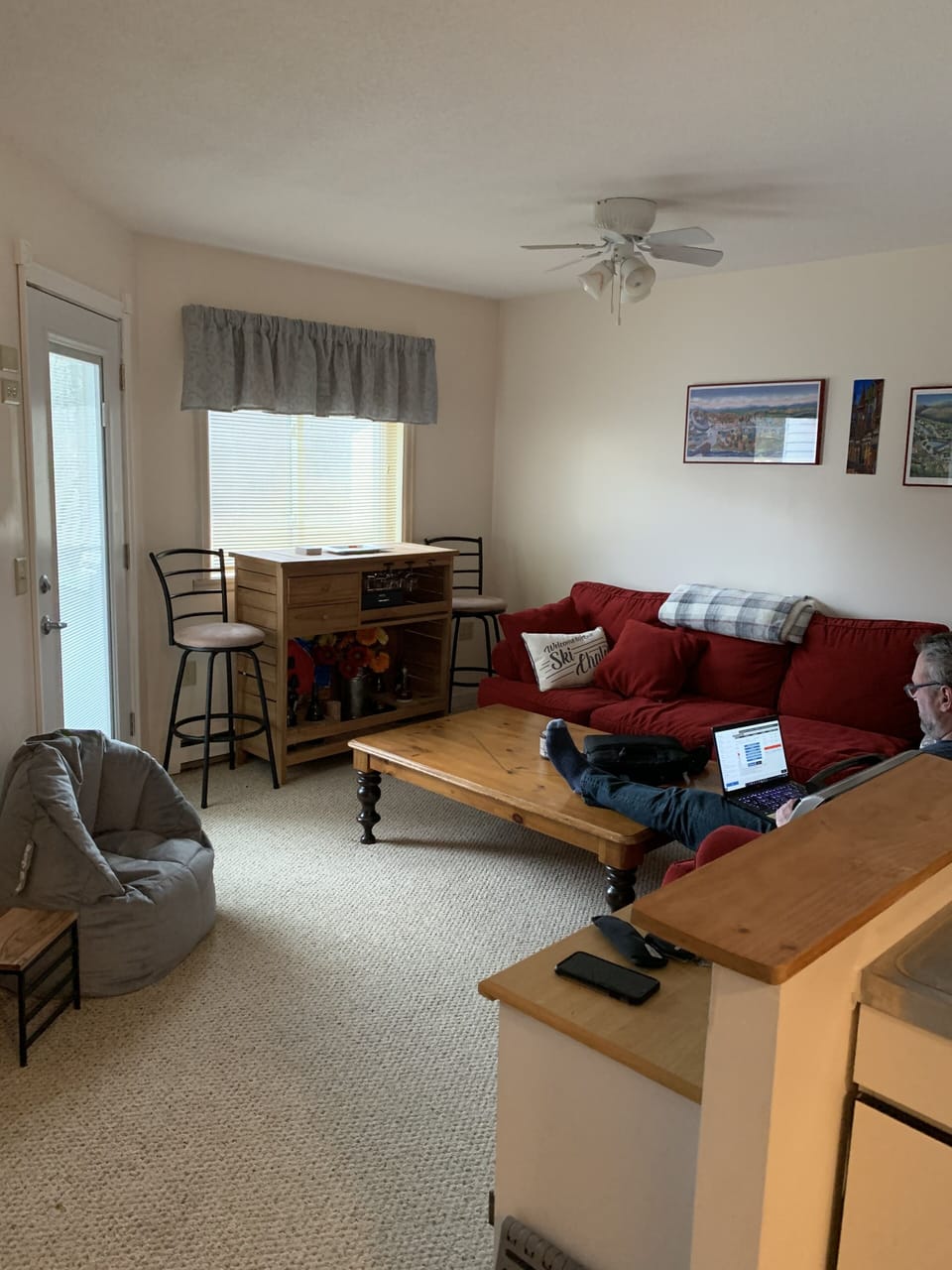 Living room with queen pull out bed.