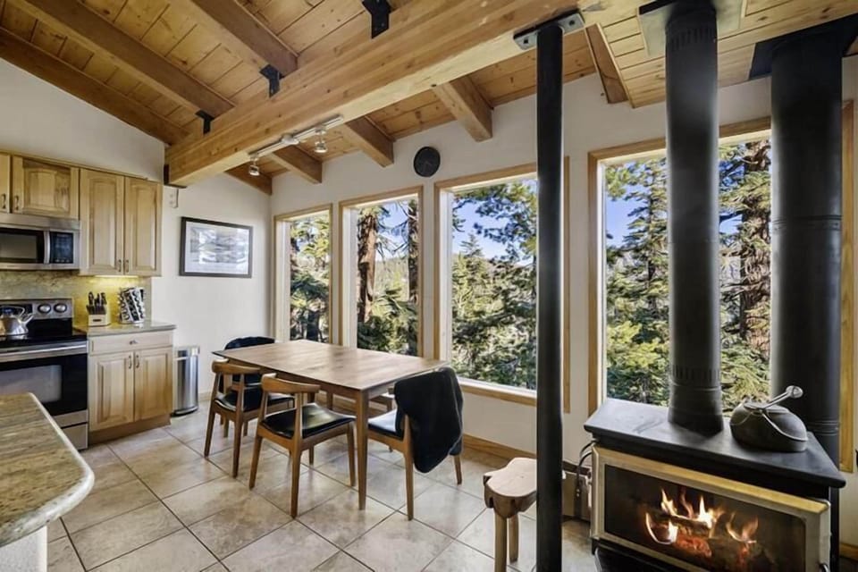 Dining table by the wall of windows