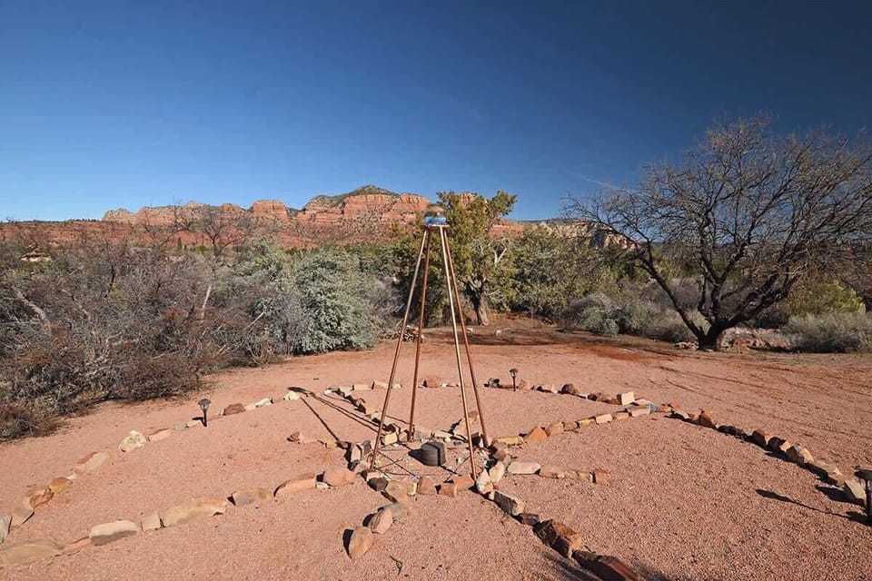 The back yard includes a large medicine wheel